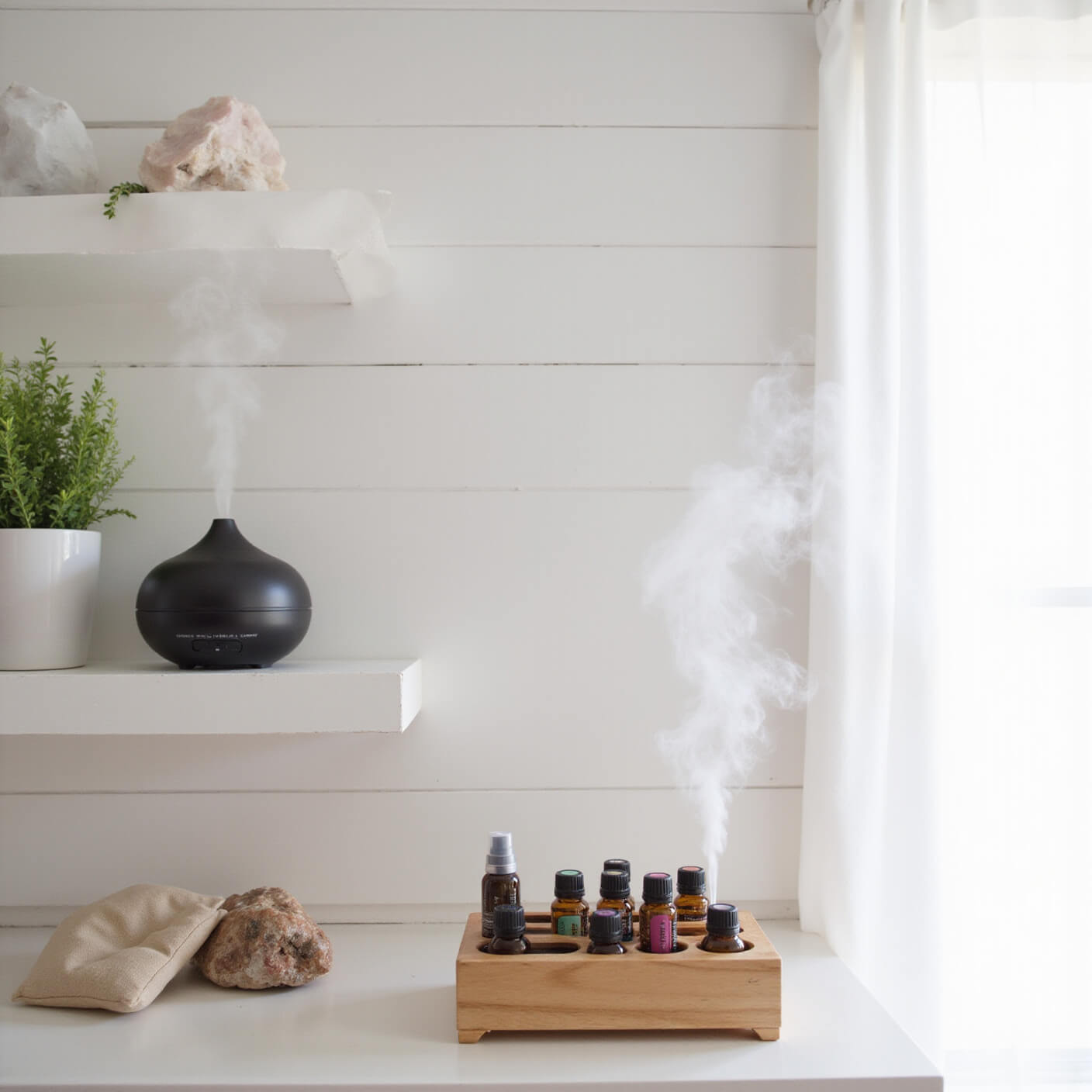 Bright wellness room with white shiplap walls, wooden essential oil organizer, diffuser mist, eucalyptus plant, crystals, and aromatherapy eye pillows on floating shelves.