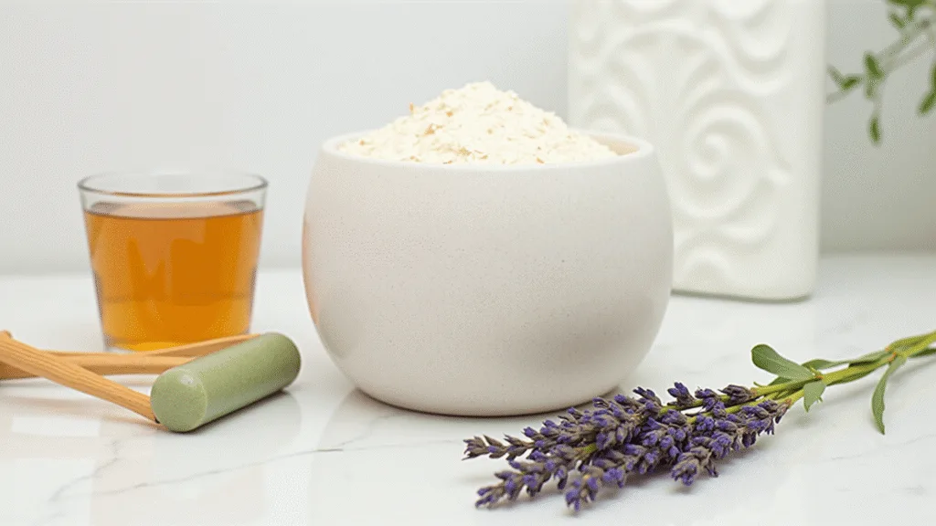 "Natural skincare ritual with ingredients like baking soda, tea tree, oatmeal, honey, a steam bowl, bamboo tools, jade roller, and dried lavender on a marble counter in soft morning light."